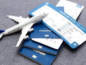 A tourist smiling at an airport immigration counter, entering one of the best visa on arrival countries for tourists